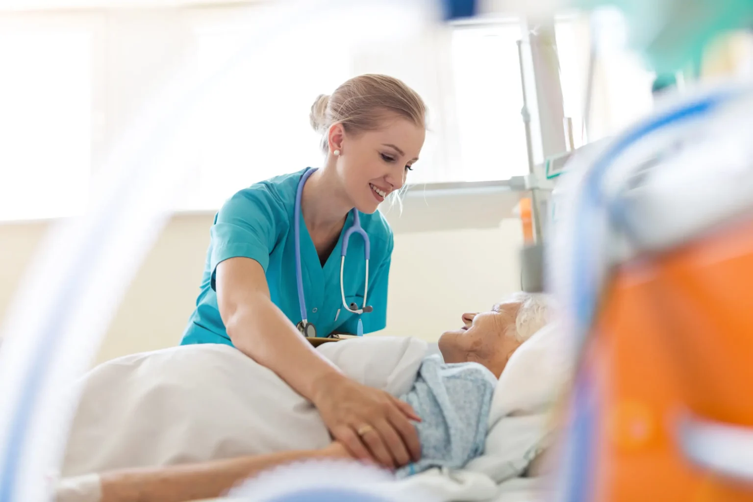 Nurse caring for a patient at home